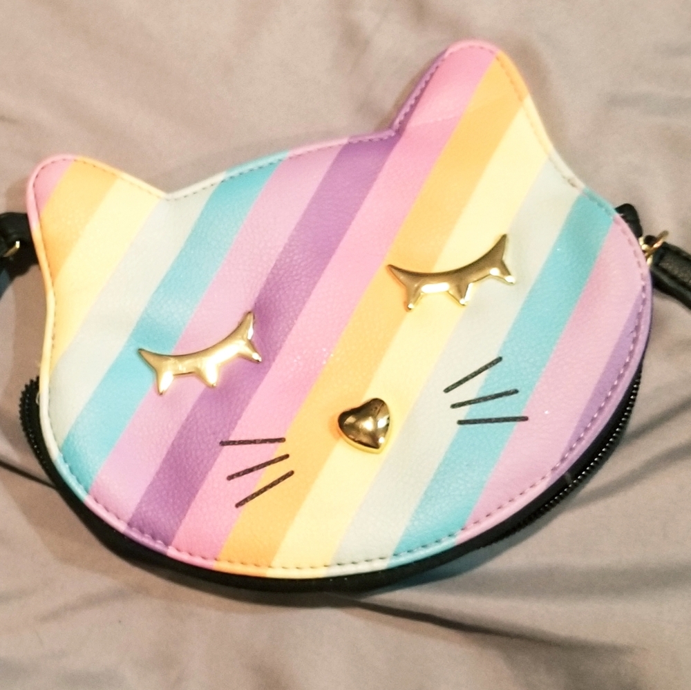 Like New,Nvr usd Betsey Johnson Rainbow cat wrisle